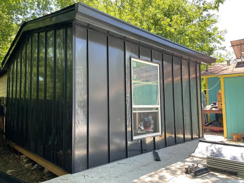 Black standing seam metal wall panels for Metal Roof Installation in Brooklyn Center