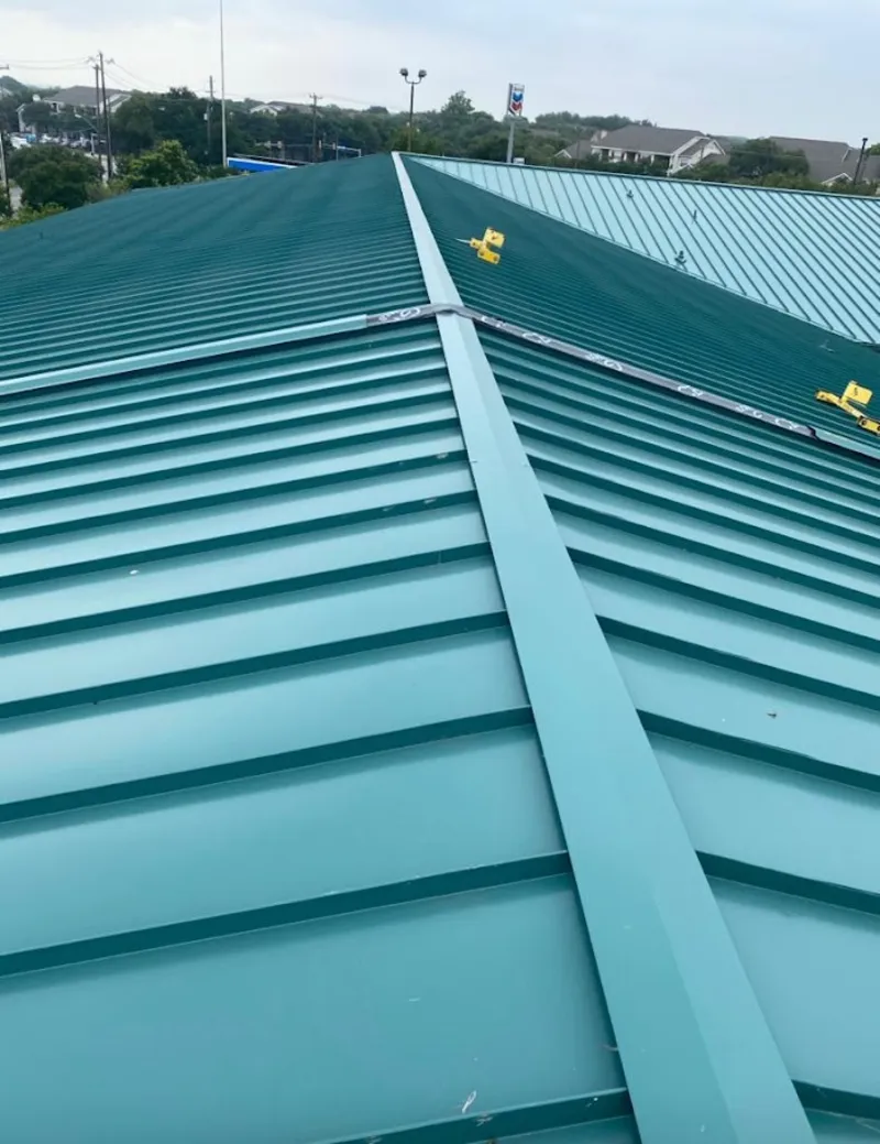 Green commercial metal roof ridge and valley for Metal Roof Repair in Brooklyn Center